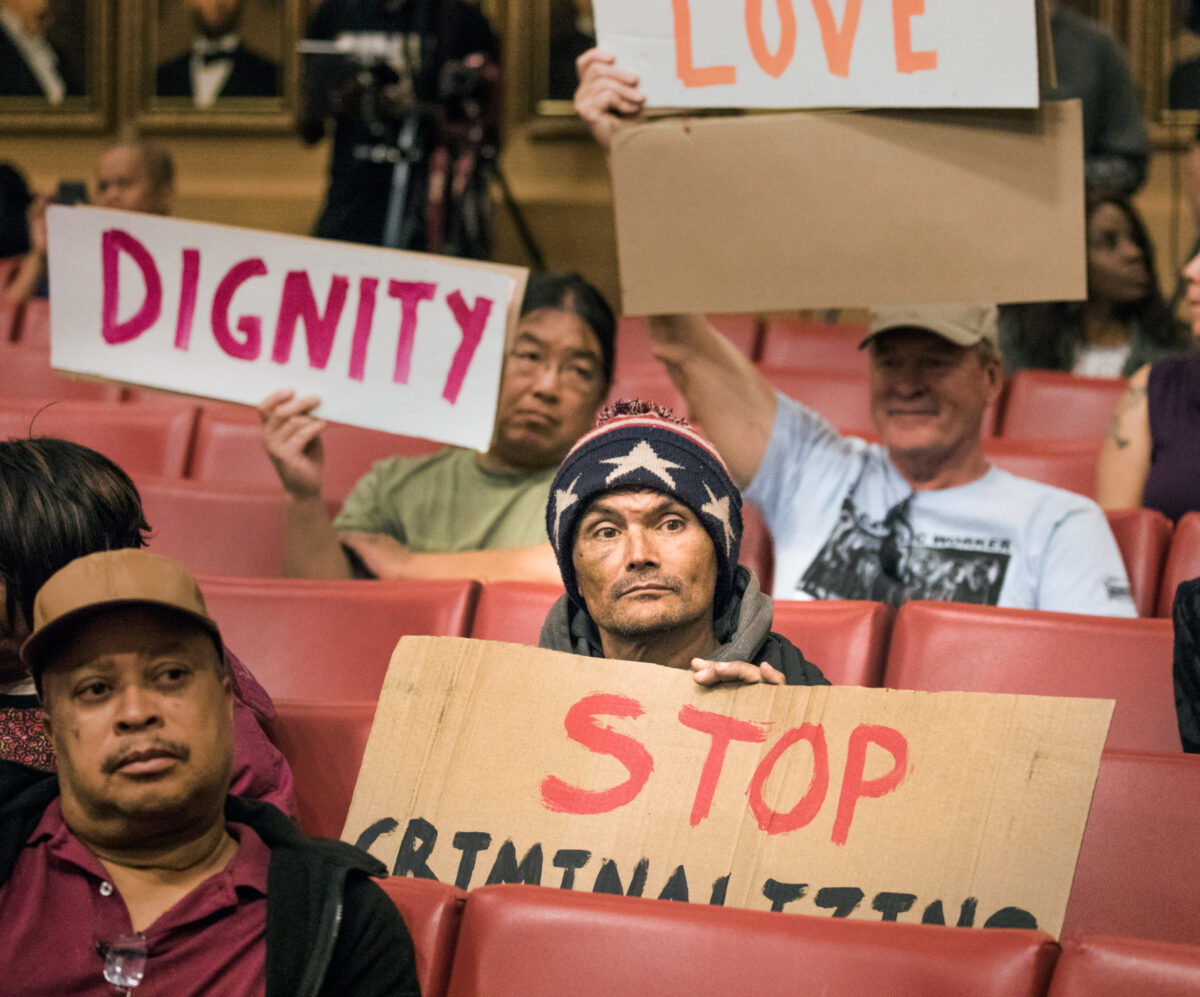 Citizens protest during the Las Vegas City Council meeting on Wednesday, Nov. 6, 2019, to consider a controversial proposal that would ban people from sleeping in public areas in downtown Las Vegas. (Jeff Scheid/Nevada Independent)